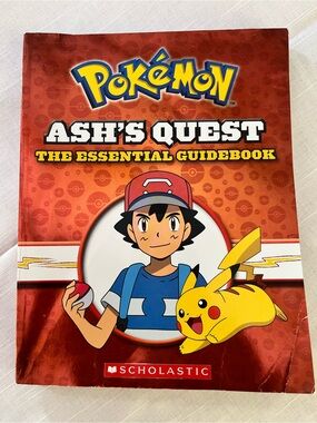 Scholastic Pokémon Guidebook Red Cover with Yellow Accents